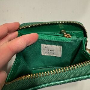 “A new day” green wallet